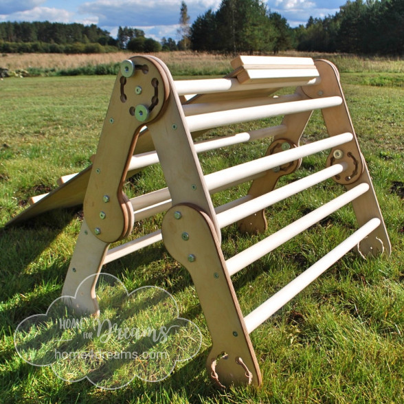 Transformable wooden climbing toy on a lawn