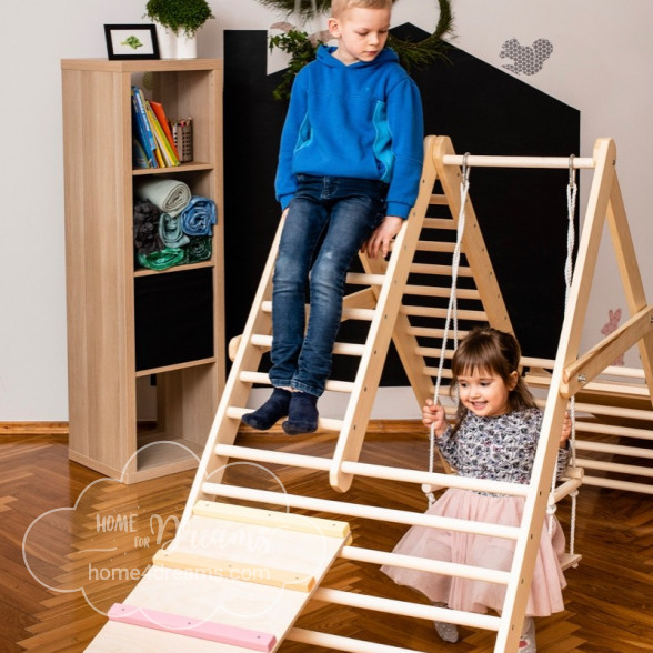Children having fun on a climbing ladder