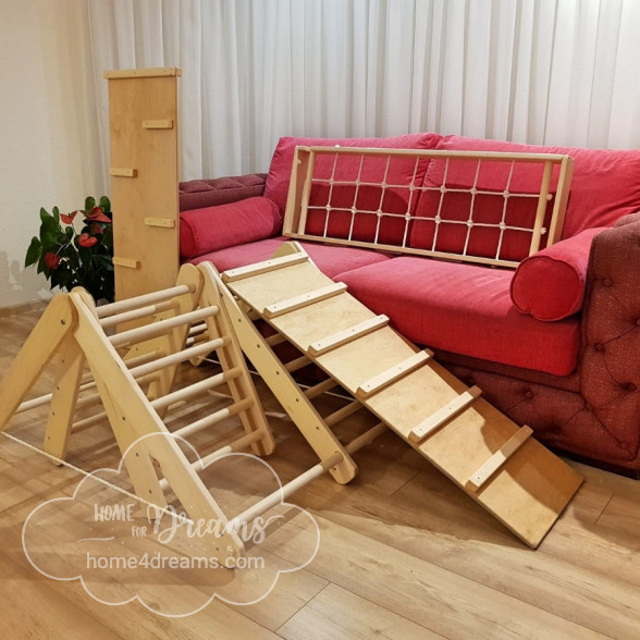 Kids climbing toy next to a couch