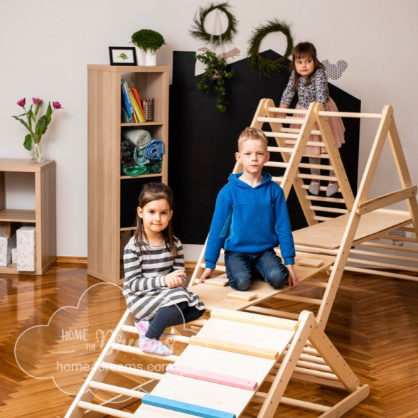 Children playing on a climbing ladder