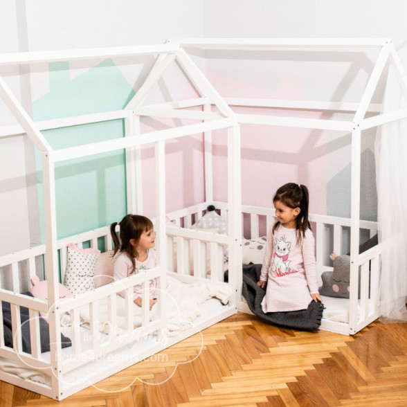 A kids floor bed with various soft toys