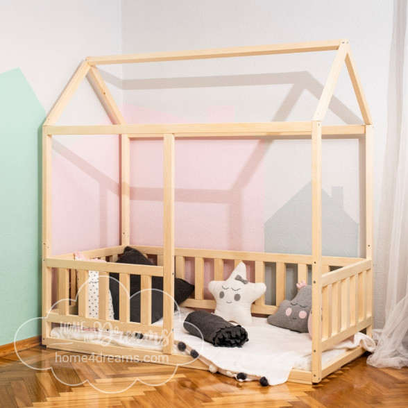 A kids floor bed with various soft toys