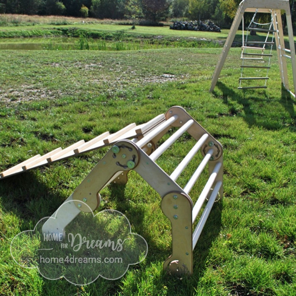 Several climb up toys on a field